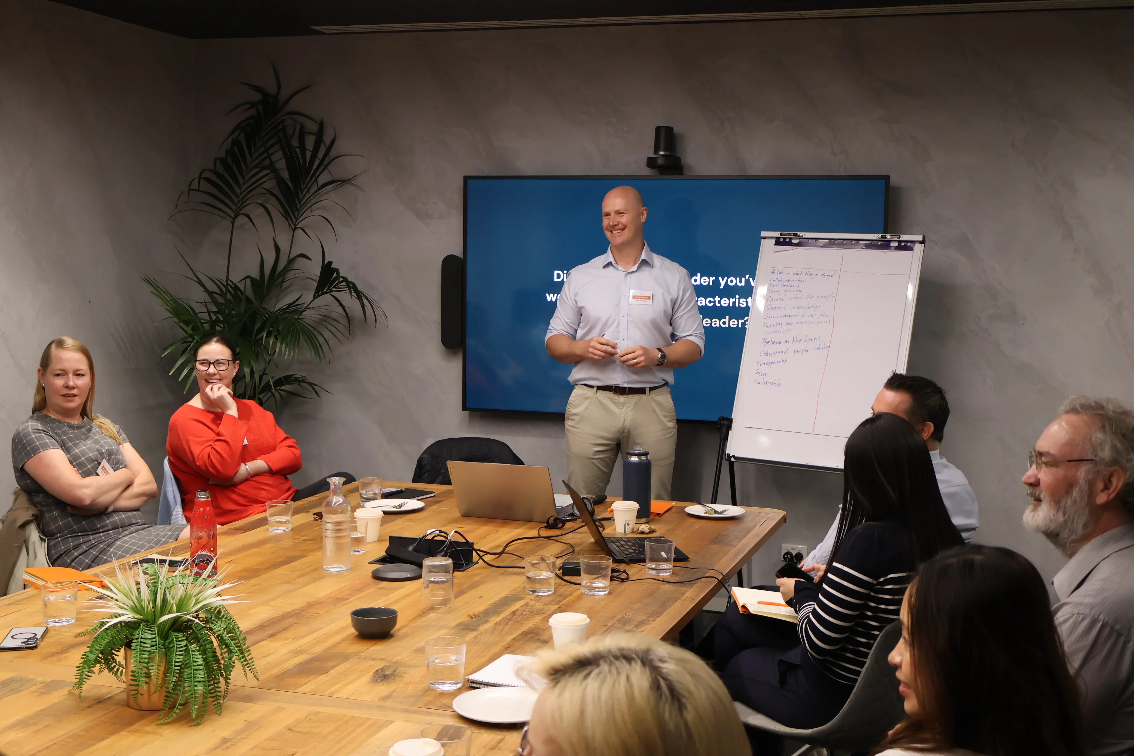 James Jensen leading a presentation in front of group